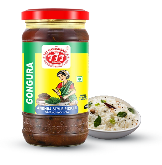 Authentic Andhra Gongura Pickle in a jar, made with fresh sorrel leaves, aromatic spices, and oil for a tangy and spicy flavor.